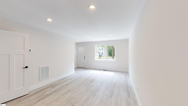 3838 Maid Marion Ln, Spartanburg, SC 29302 - empty room featuring light wood-type flooring, recessed lighting, and baseboards