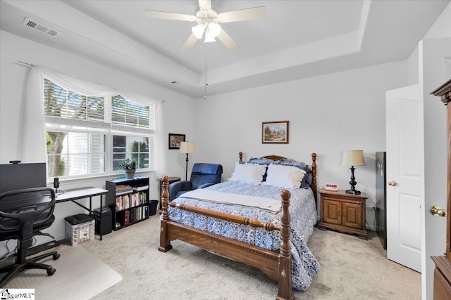 101 Roberts Hill Dr, Taylors, SC 29687 - bedroom featuring light colored carpet, a tray ceiling, a desk, and ceiling fan