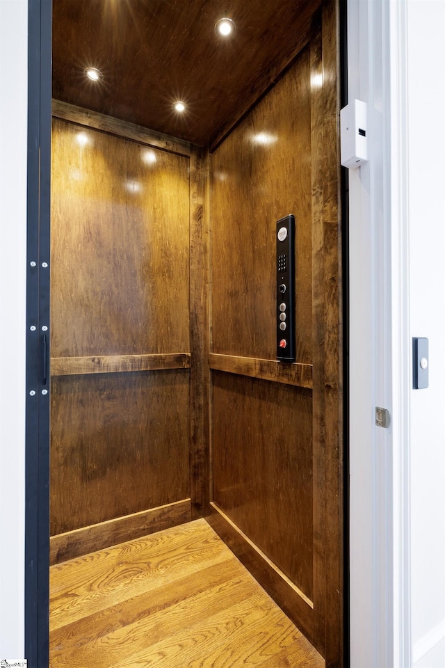 36 Southland Ave, Greenville, SC 29601 - elevator with wood finished floors and recessed lighting