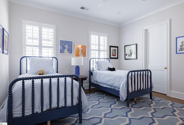 36 Southland Ave, Greenville, SC 29601 - bedroom with wood finished floors, ornamental molding, and baseboards