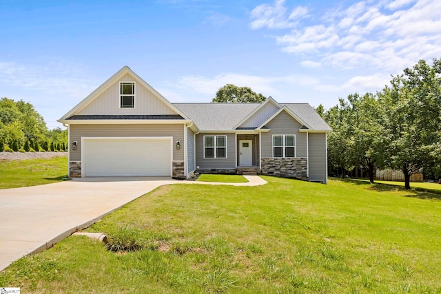 381 Butler Rd, Lyman, SC 29365 - craftsman-style house featuring stone siding, concrete driveway, and a front lawn