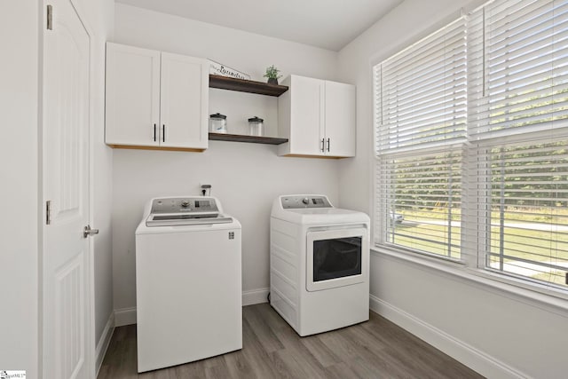 381 Butler Rd, Lyman, SC 29365 - washroom with independent washer and dryer, cabinet space, wood finished floors, and baseboards