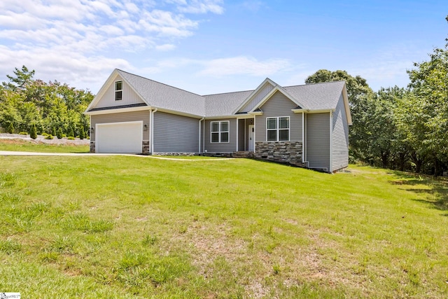 381 Butler Rd, Lyman, SC 29365 - view of front of house with a garage, a front yard, and stone siding