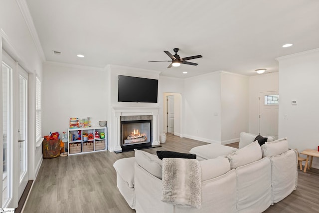 381 Butler Rd, Lyman, SC 29365 - living room with a lit fireplace, a ceiling fan, wood finished floors, recessed lighting, and baseboards