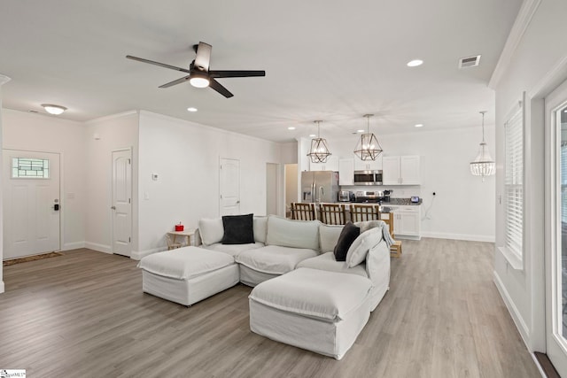 381 Butler Rd, Lyman, SC 29365 - living area featuring recessed lighting, light wood finished floors, baseboards, ornamental molding, and a ceiling fan
