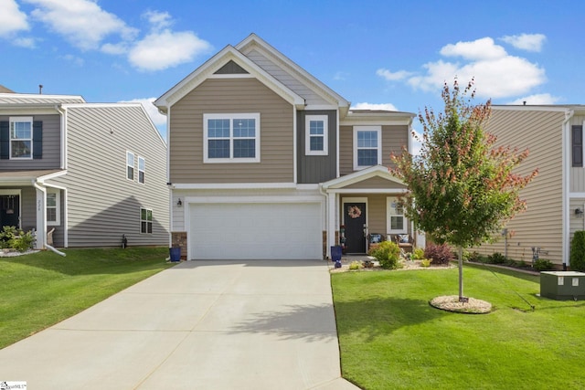 224 Anna Gray Cir, Easley, SC 29640 - view of front of house featuring concrete driveway, a garage, and a front lawn
