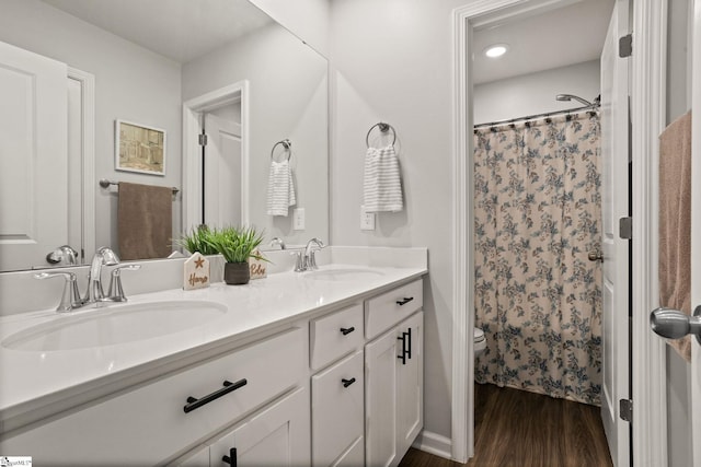 224 Anna Gray Cir, Easley, SC 29640 - full bathroom with double vanity, toilet, wood finished floors, a shower with shower curtain, and recessed lighting