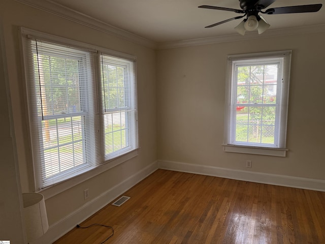 206 Rogers Ave, Greenville, SC 29617 - unfurnished room featuring baseboards, wood finished floors, ornamental molding, and ceiling fan