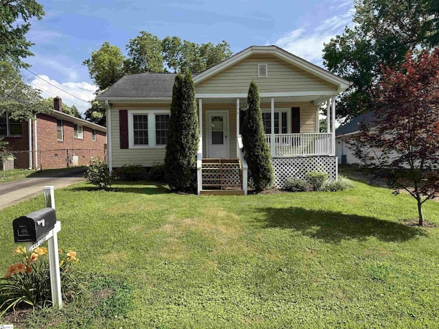 206 Rogers Ave, Greenville, SC 29617 - view of front of house with covered porch and a front lawn