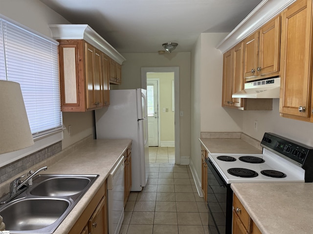 206 Rogers Ave, Greenville, SC 29617 - kitchen featuring white appliances, under cabinet range hood, a sink, light tile patterned floors, and light countertops