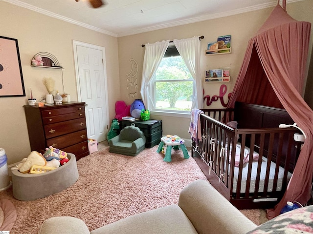 206 Caldwell St, Clinton, SC 29325 - bedroom featuring a crib, ornamental molding, and baseboards