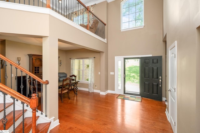 112 Woodstone Dr, Easley, SC 29642 - foyer featuring a high ceiling, wood finished floors, plenty of natural light, and stairs