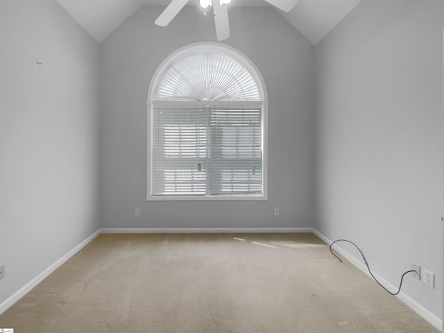 134 Lauren Wood Cir, Taylors, SC 29687 - spare room with vaulted ceiling, ceiling fan, carpet flooring, and baseboards