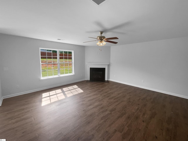 253 Golden Bear Walk, Duncan, SC 29334 - unfurnished living room with a ceiling fan, dark wood-style flooring, baseboards, and a fireplace with flush hearth