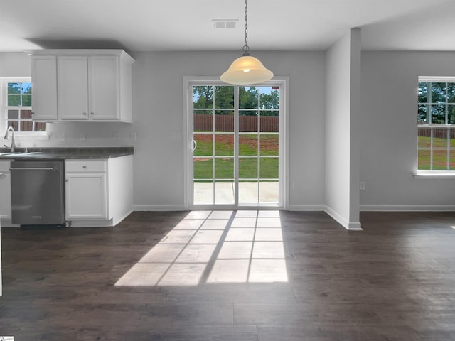 253 Golden Bear Walk, Duncan, SC 29334 - unfurnished dining area featuring dark wood-type flooring, baseboards, and a sink