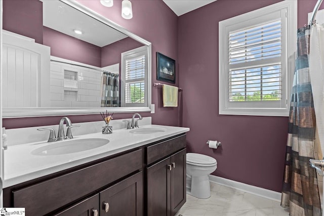 79 Modesto Ln, Simpsonville, SC 29681 - full bath featuring double vanity, toilet, marble look tile flooring, baseboards, and a shower with curtain