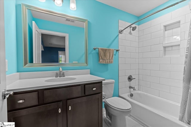 79 Modesto Ln, Simpsonville, SC 29681 - bathroom featuring toilet, vanity, and tub / shower combination