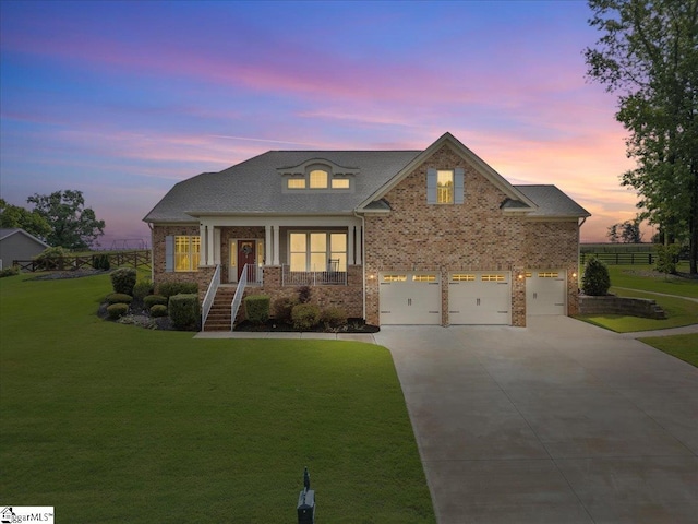 79 Modesto Ln, Simpsonville, SC 29681 - view of front facade with concrete driveway, a front yard, brick siding, and a garage