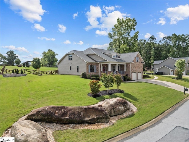 79 Modesto Ln, Simpsonville, SC 29681 - craftsman-style home with a garage, brick siding, and driveway