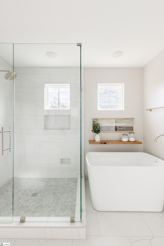 738 Judah Dr, Moore, SC 29369 - full bathroom featuring healthy amount of natural light, a shower stall, and a freestanding tub