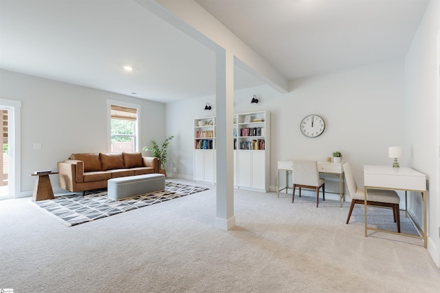 738 Judah Dr, Moore, SC 29369 - carpeted living area with baseboards and beam ceiling