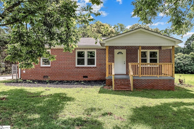 3401 Comanche St, Anderson, SC 29626 - bungalow featuring covered porch, crawl space, a front yard, brick siding, and roof with shingles
