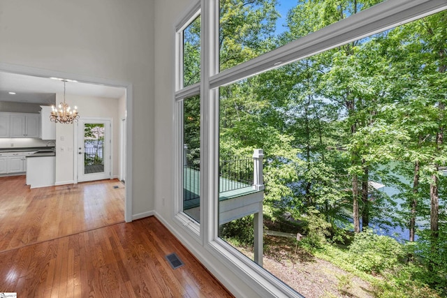 118 Pinnacle Pointe Dr, Seneca, SC 29672 - unfurnished sunroom featuring a chandelier and a sink