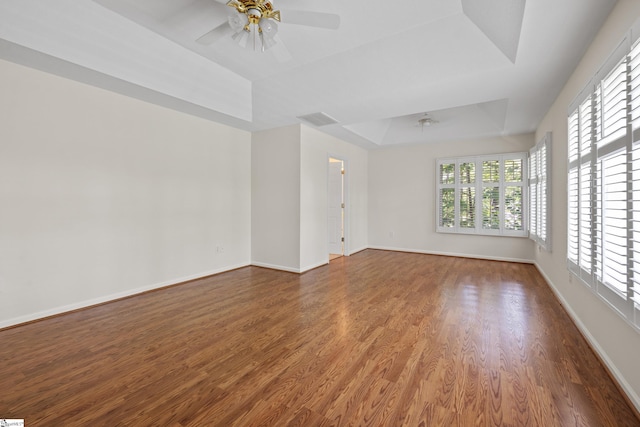 118 Pinnacle Pointe Dr, Seneca, SC 29672 - empty room with ceiling fan, a raised ceiling, and wood finished floors