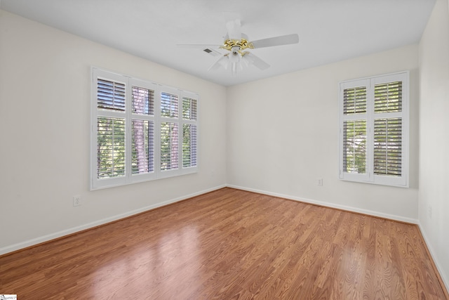 118 Pinnacle Pointe Dr, Seneca, SC 29672 - empty room featuring wood finished floors and a ceiling fan