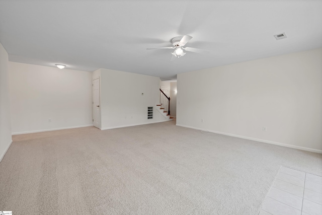 118 Pinnacle Pointe Dr, Seneca, SC 29672 - empty room with ceiling fan, stairway, and light carpet