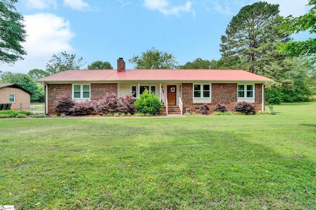 203 Ponder Rd, Greer, SC 29651 - ranch-style house with a chimney, a metal roof, and brick siding