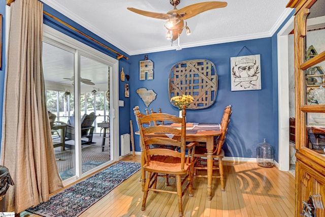 203 Ponder Rd, Greer, SC 29651 - dining room with a ceiling fan, hardwood / wood-style floors, and ornamental molding