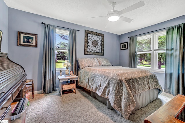 203 Ponder Rd, Greer, SC 29651 - bedroom featuring multiple windows, carpet flooring, a textured ceiling, and ceiling fan