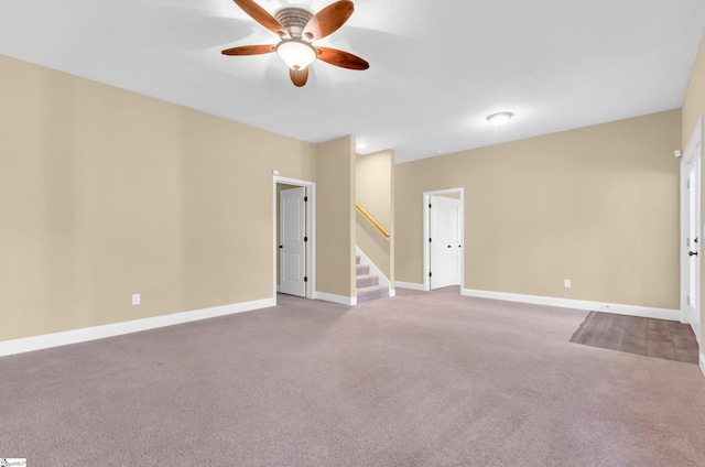 214 New Salem Dr, Anderson, SC 29625 - spare room featuring carpet, a ceiling fan, and stairway