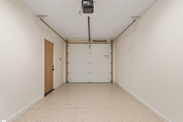 18 Nordic Ln, Greenville, SC 29609 - garage with a garage door opener and baseboards