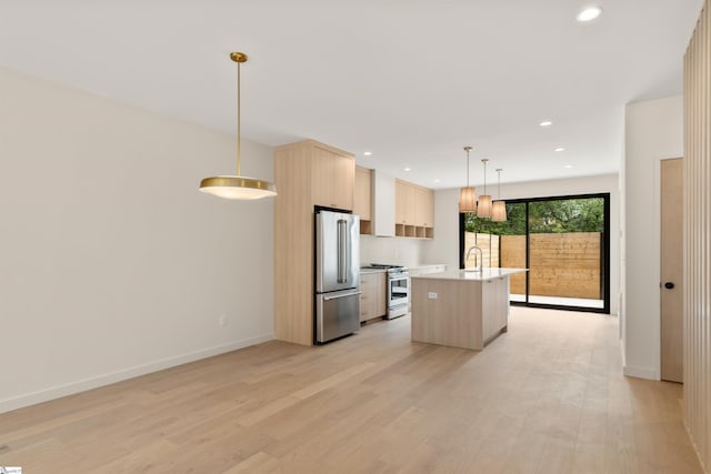 18 Nordic Ln, Greenville, SC 29609 - kitchen with appliances with stainless steel finishes, light brown cabinets, light countertops, light wood-type flooring, and recessed lighting