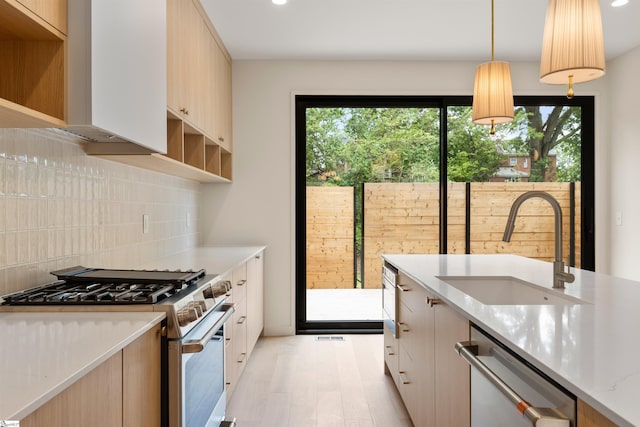 18 Nordic Ln, Greenville, SC 29609 - kitchen with appliances with stainless steel finishes, healthy amount of natural light, backsplash, light wood-style floors, and recessed lighting