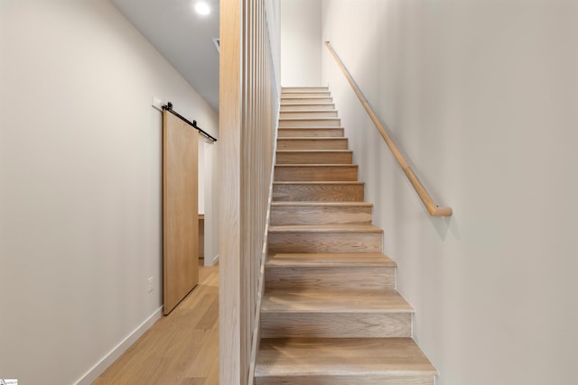 18 Nordic Ln, Greenville, SC 29609 - staircase with a barn door, wood finished floors, and recessed lighting