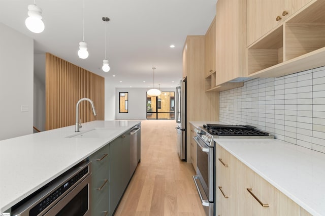 20 Nordic Ln, Greenville, SC 29609 - kitchen with appliances with stainless steel finishes, light brown cabinetry, modern cabinets, and recessed lighting