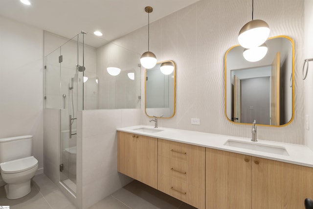 20 Nordic Ln, Greenville, SC 29609 - bathroom with a stall shower, double vanity, tile patterned flooring, and recessed lighting
