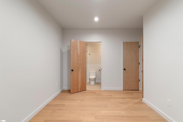 20 Nordic Ln, Greenville, SC 29609 - unfurnished bedroom featuring light wood-type flooring, ensuite bath, and recessed lighting