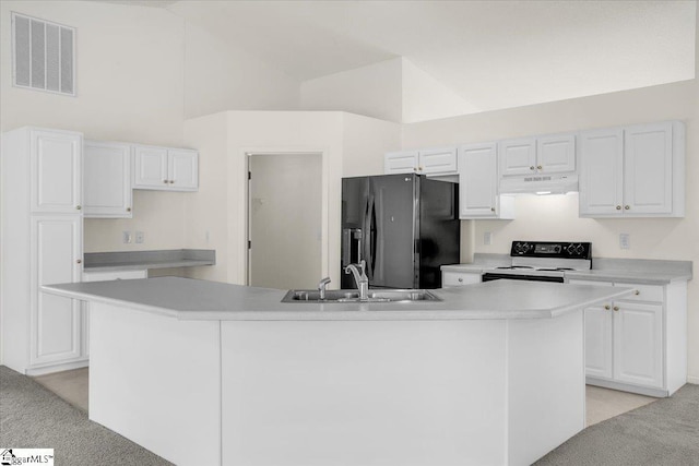 2013 Small Meadows Ct, Fountain Inn, SC 29644 - kitchen with black fridge with ice dispenser, white electric range oven, light colored carpet, under cabinet range hood, and white cabinets