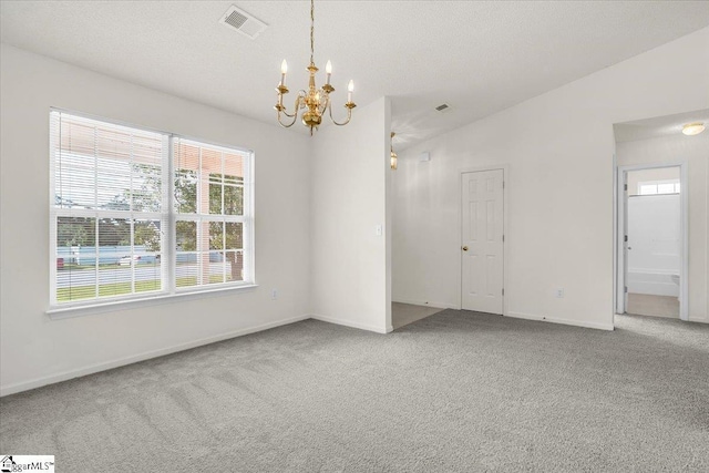 2013 Small Meadows Ct, Fountain Inn, SC 29644 - unfurnished room with a chandelier, carpet floors, and vaulted ceiling