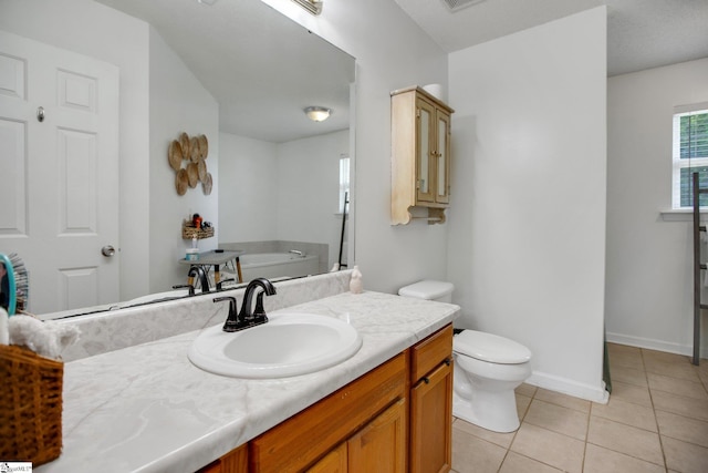 101 Bitternut Ln, Taylors, SC 29687 - bathroom with tile patterned floors, vanity, and a bathtub