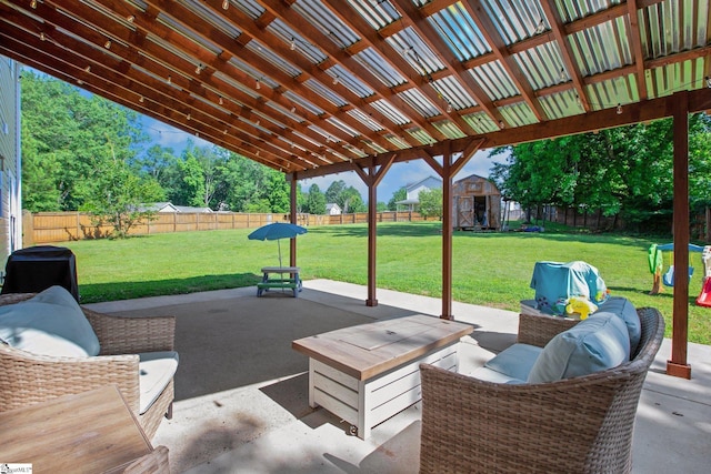 101 Bitternut Ln, Taylors, SC 29687 - fenced backyard with a storage unit and a patio area