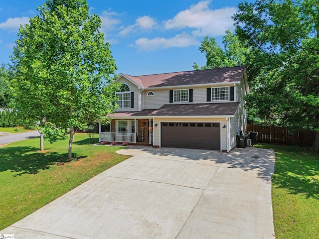 101 Bitternut Ln, Taylors, SC 29687 - traditional home featuring concrete driveway, a porch, and an attached garage