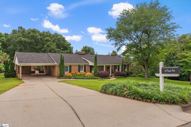 103 Crestview Cir, Greer, SC 29651 - ranch-style house featuring concrete driveway, a front lawn, and an attached carport