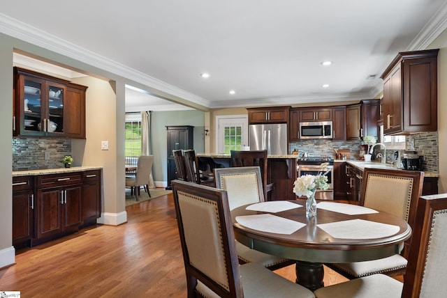 103 Crestview Cir, Greer, SC 29651 - dining area featuring light wood finished floors, crown molding, and recessed lighting