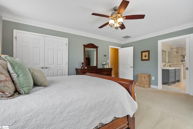 103 Crestview Cir, Greer, SC 29651 - bedroom with a closet, crown molding, light colored carpet, ceiling fan, and ensuite bath