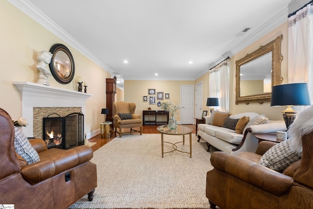 103 Crestview Cir, Greer, SC 29651 - living room with a fireplace with flush hearth, wood finished floors, ornamental molding, and recessed lighting